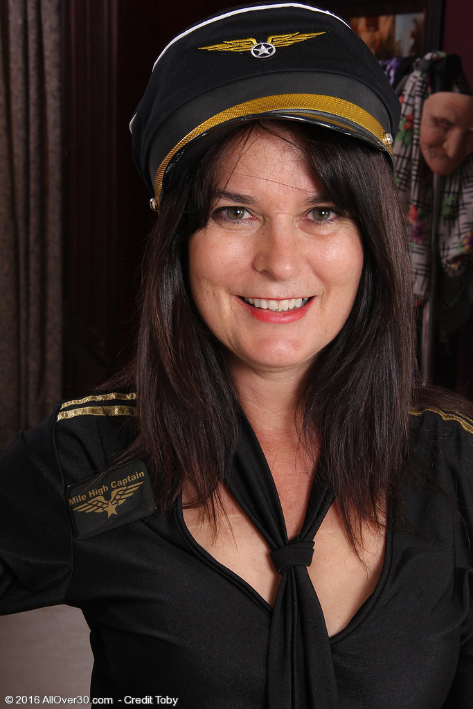 Captain Sherry Lee is ready to takeoff her clothes AllOver30 Pics